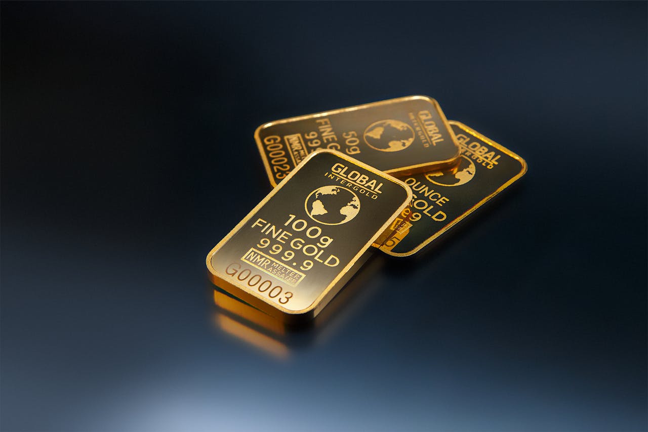 hero-img Close-up of gold bars on a dark background, representing wealth and investment opportunities.